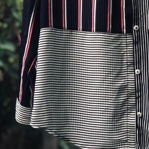 Long sleeve button down patterned shirt.